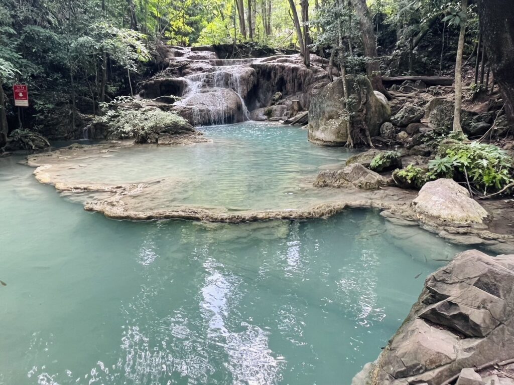 Turquoise waters at Erawan Waterfalls near Kanchanaburi.